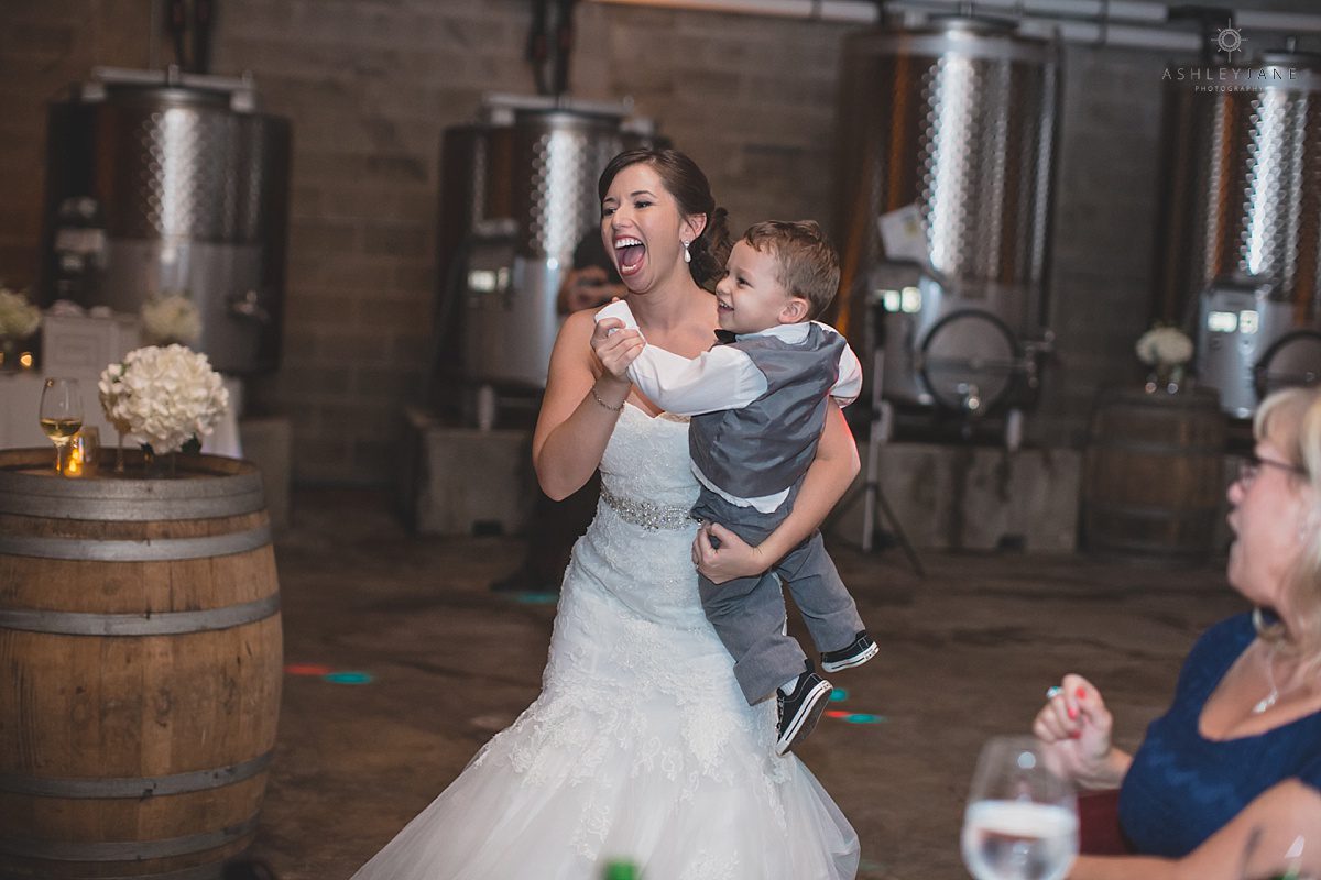 bride dancing with her ring bearer
