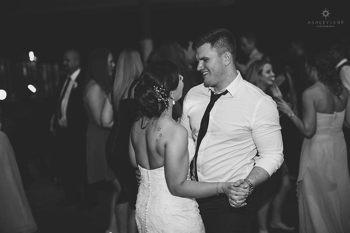 bride and groom dancing