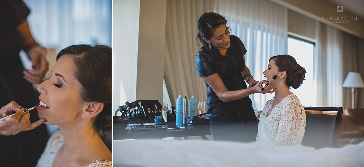 bride getting her makeup done on her wedding day
