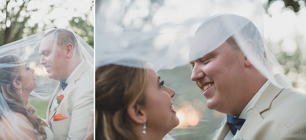 bride with her veil and groom