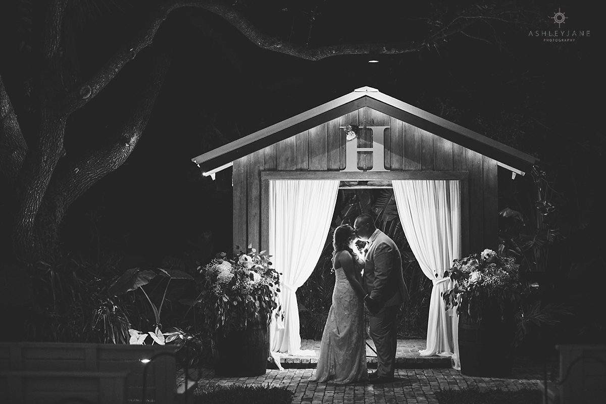 bride and groom share a kiss at the end of the night
