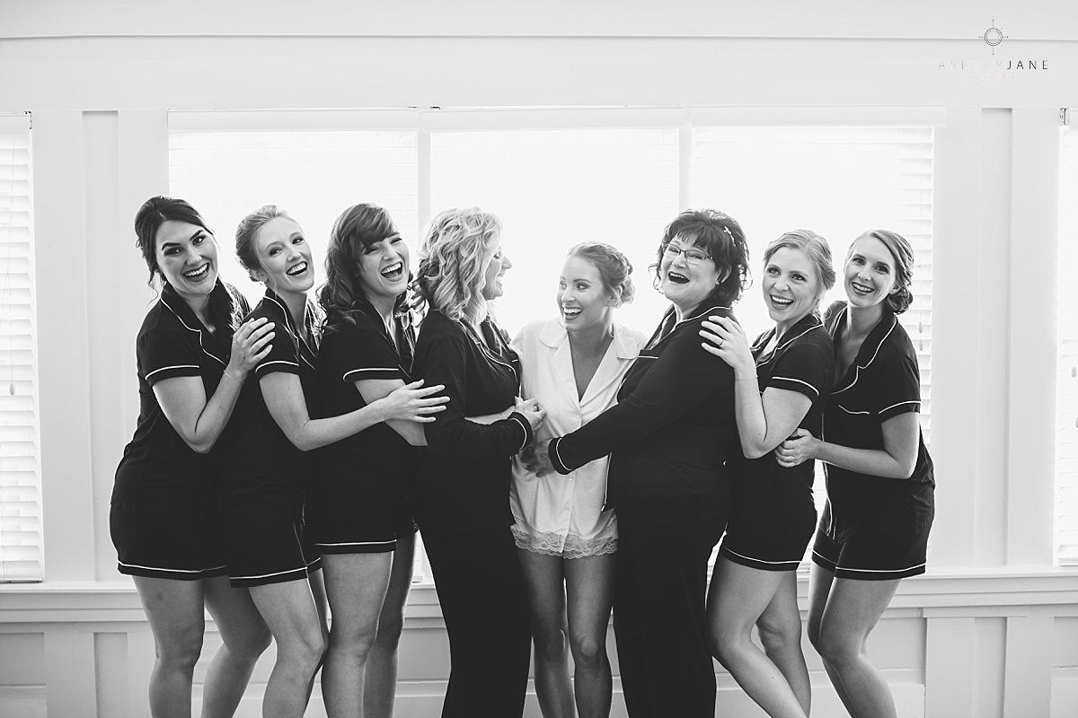 Elegant Rustic Cypress Grove Estate House Wedding| Bridesmaids getting ready with the bride in their pjs shot by orlando wedding photographer