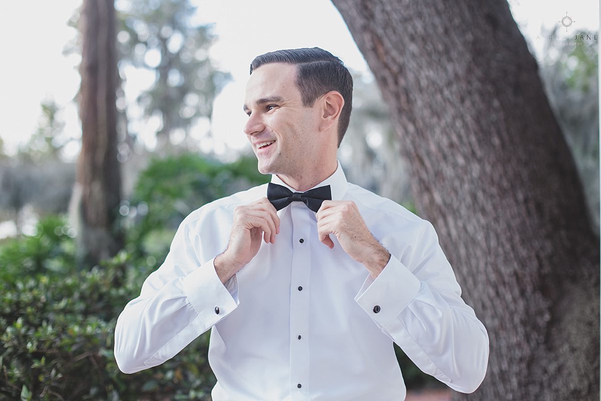 Elegant Rustic Cypress Grove Estate House Wedding| Groom getting ready on his wedding day black bow tie formal shot by orlando wedding photographer