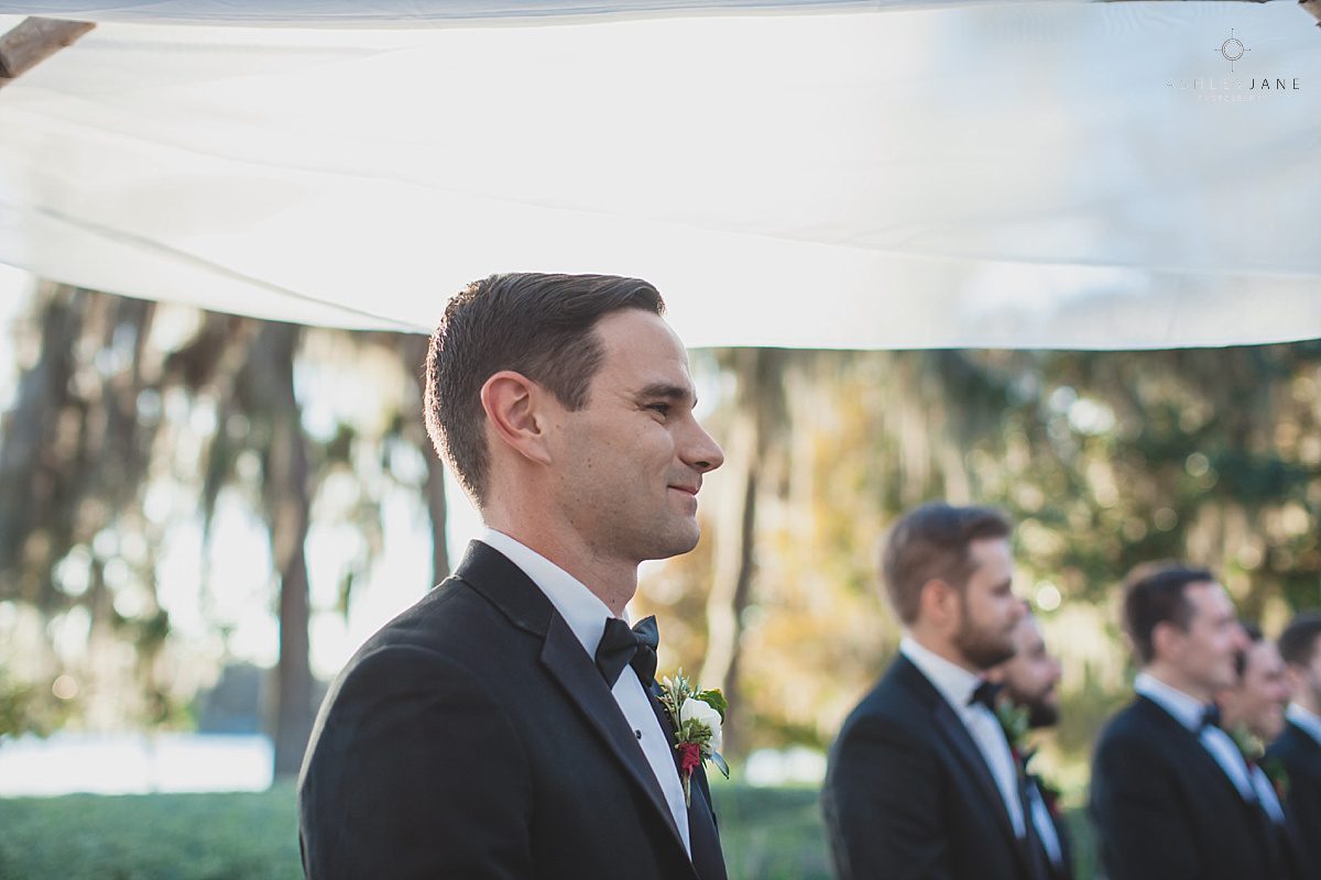 Elegant Rustic Cypress Grove Estate House Wedding | Groom waiting for his bride to come down the aisle 