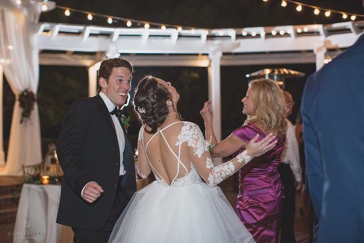 Elegant Rustic Cypress Grove Estate House Wedding | Bride dancing with her family