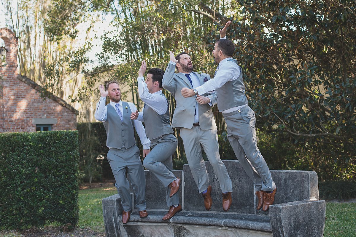 Casa Feliz | Lilac Garden Party Wedding Groom and groomsmen fooling around
