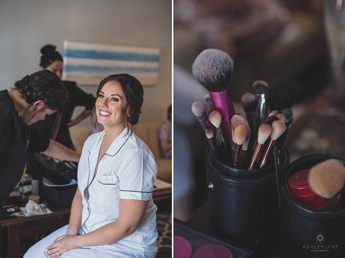 Bride is all smiles after getting her makeup done on wedding day 
