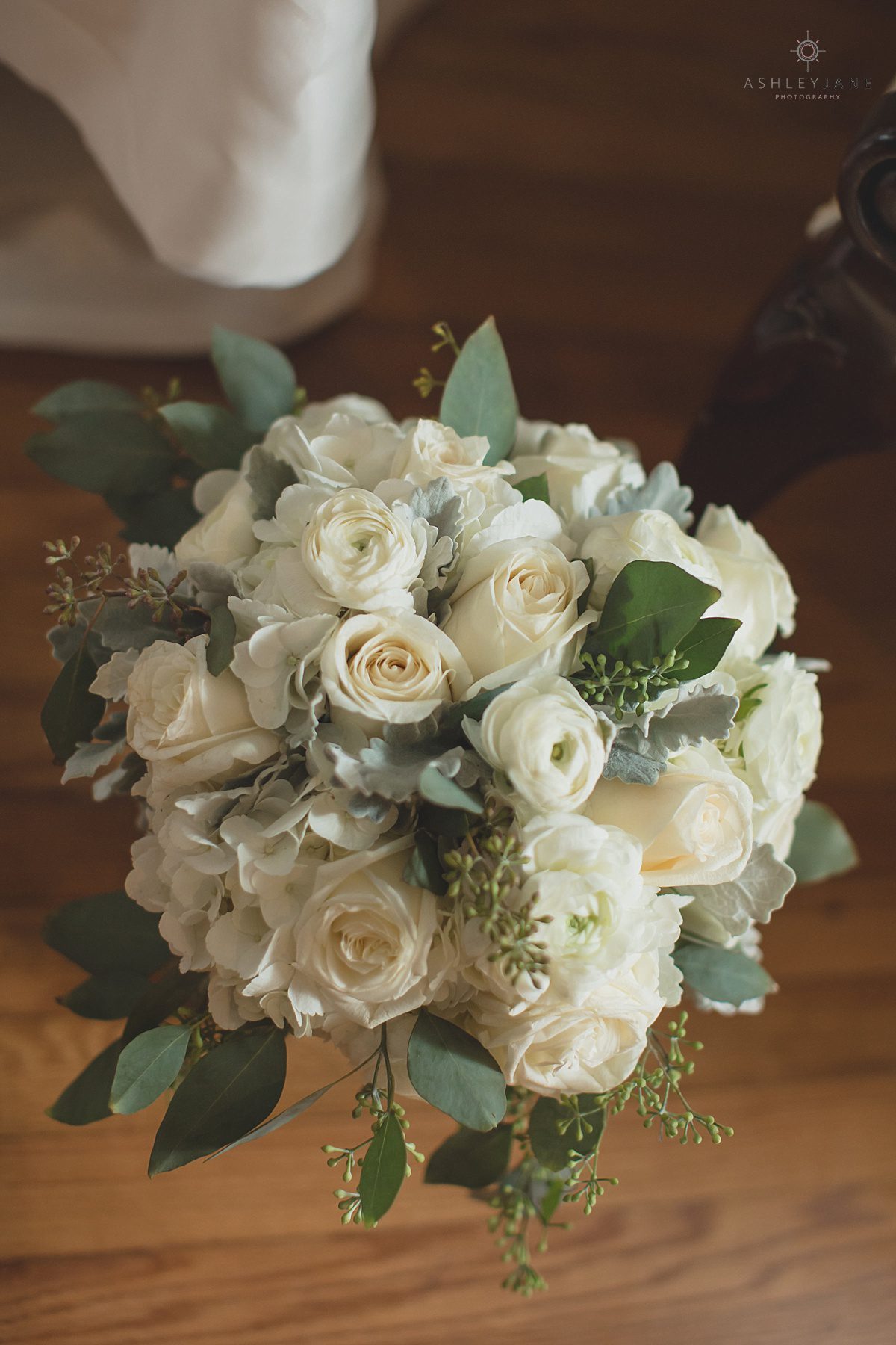 Ivory and dusty blue bridal bouquet shot by orlando wedding photographer 