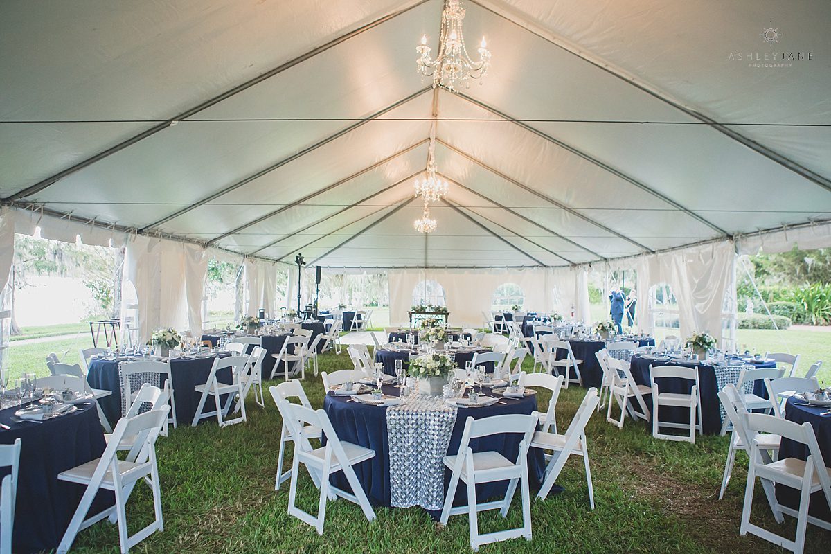 Outdoor navy and white tented Southern Estate House Wedding reception