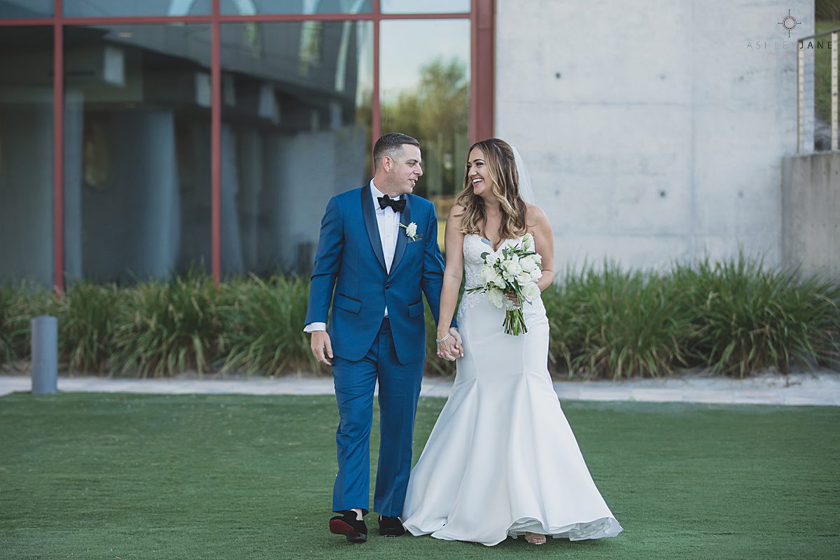 Groom reacting to seeing his bride for the first time during the first look at The Clubhouse at Streamsong Red shot by orlando wedding photographer