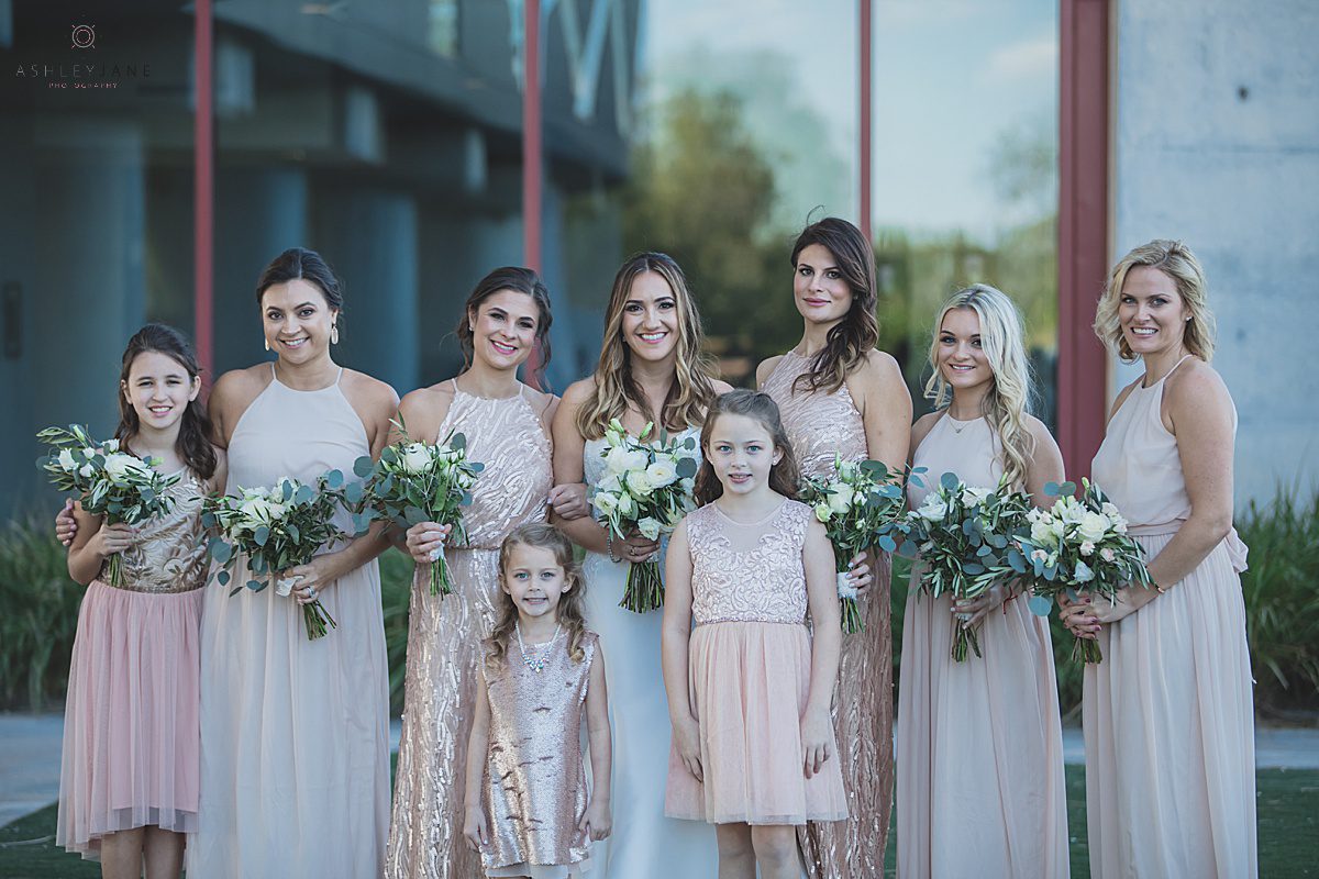 Bride with the bridesmaids and flower girls shot by orlando wedding photographer