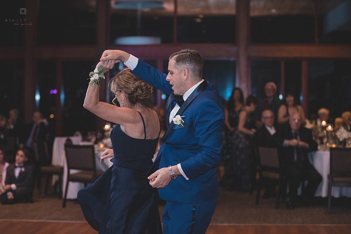 Groom dancing with his mom shot by orlando wedding photographer