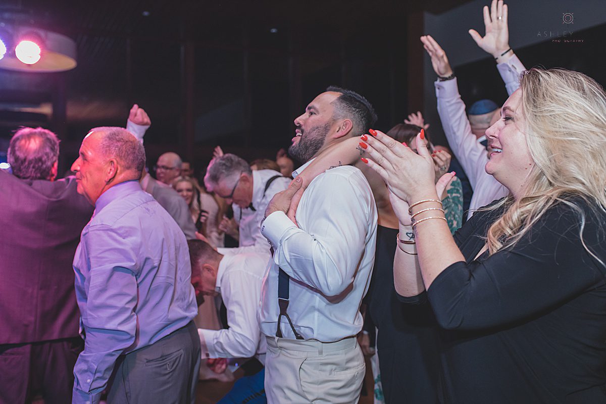 Guests dancing at the clubhouse at streamsong shot by orlando wedding photographer