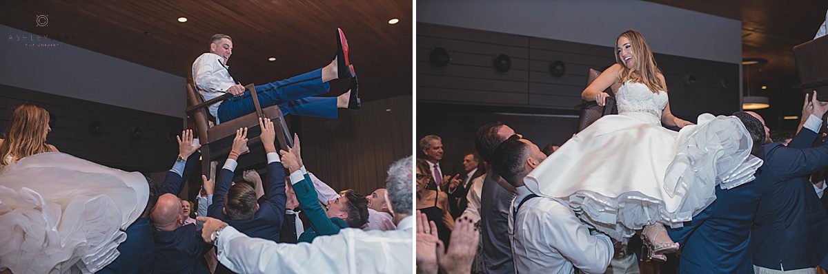 Bride and groom getting lifted during their Jewish reception shot by orlando wedding photographer