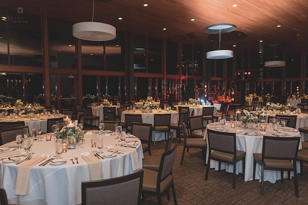 Bride and groom walking under their sparkler grand exit shot by orlando wedding photographer